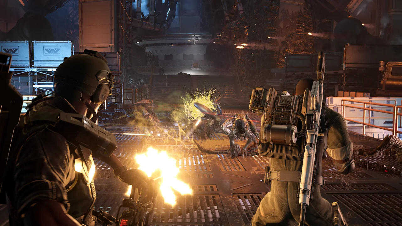 Aliens: Fireteam Elite 2 key art: four colonial marines with pulse rifles facing a wall of xenomorphs in a dark corridor