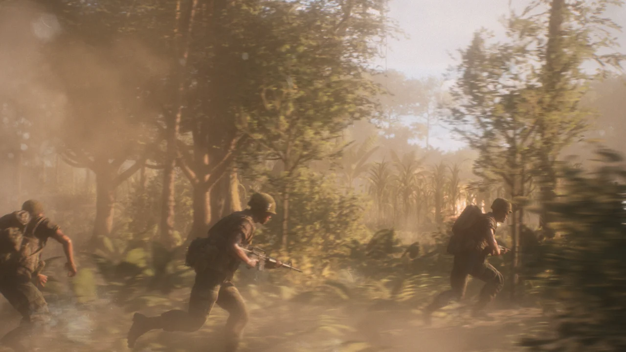 Hell Let Loose: Vietnam gameplay: a squad advancing through tall grass and jungle foliage toward a contested objective