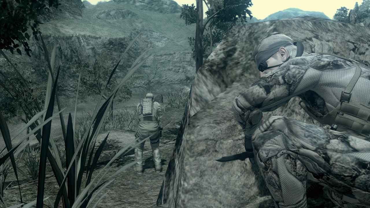 MGS4 cutscene — Old Snake and Otacon in a tense narrative moment, characteristic of the game's long cinematic sequences