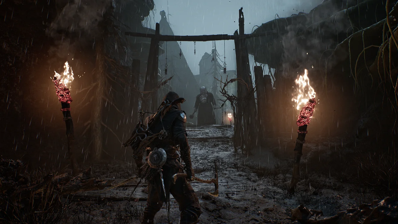 Mortal Shell II combat: the player character swinging a heavy weapon at a giant creature inside a ruined temple