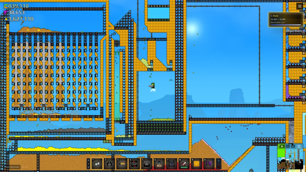 Sandustry: a pixelated desert world with mining machinery, conveyor lines, and automated factories carved into fully destructible terrain