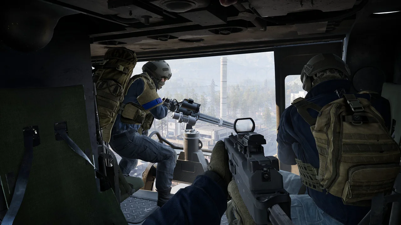 WARDOGS combat: a soldier fires at an enemy position across a ruined industrial yard with destructible cover